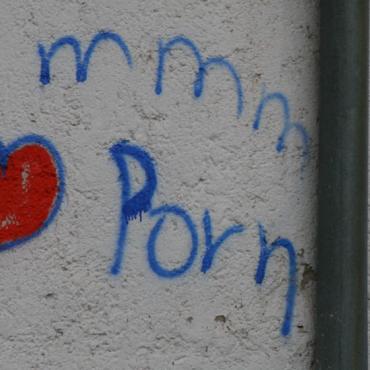 Image description: Grafitti saying mmm i heart porn 