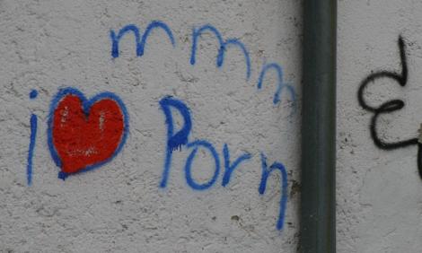 Image description: Grafitti saying mmm i heart porn 