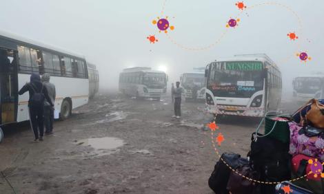 Image description: Returnees at bus stand in Manipur